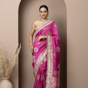 Vibrant Rani Pink with elegant gold zari detailing